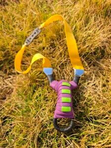 Pocket Snipe - The Stealthy Powerhouse Don't let the understated appearance of the Pocket Snipe fool you. This slingshot is a powerhouse, crafted from high-quality stainless steel using cold-bending techniques. Its purple and black color scheme not only looks sleek but also makes it a stylish addition to any collection. The Pocket Snipe is designed for precision, with a clear sighting point and comfortable grip, making it a reliable choice for shooters of all levels.